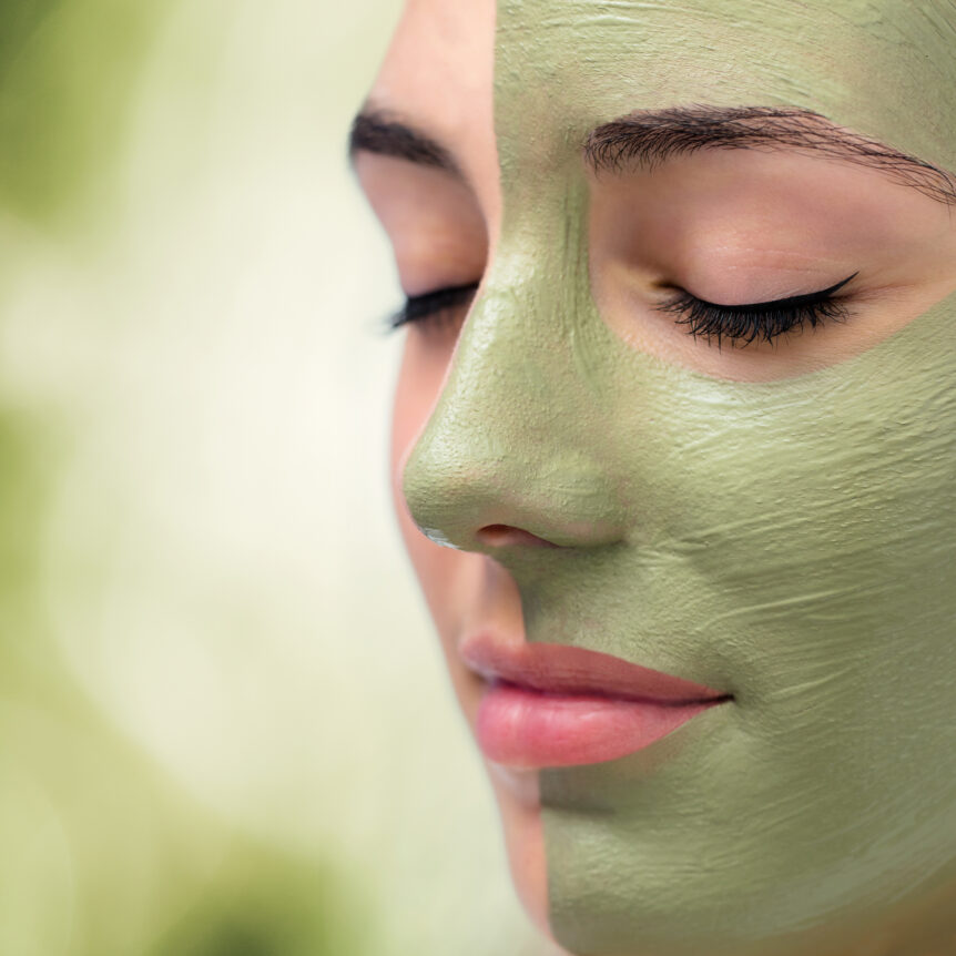 Woman with algae mask on face